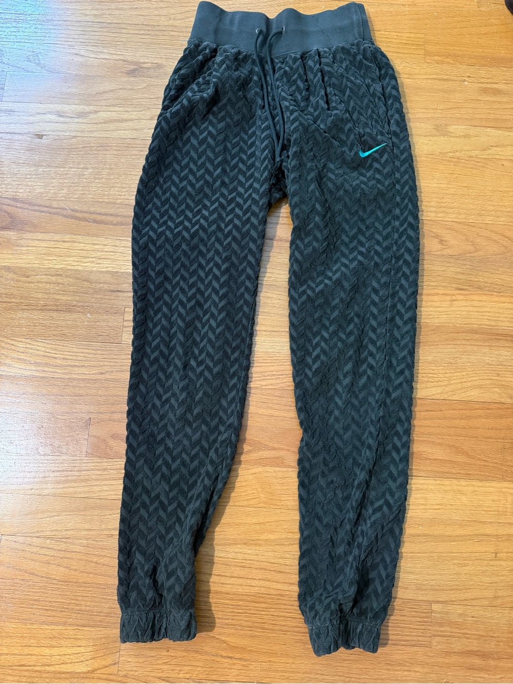 Nike womens Black Textured Jogger Pants with Teal Swoosh